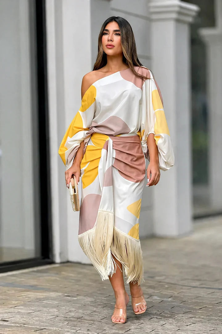 Vestido Sunset Fringe™ - Glamour y sofisticación con un estilo que roba miradas.