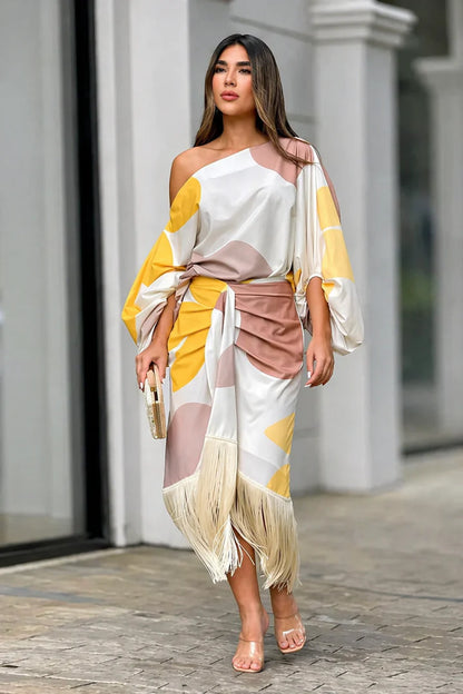 Vestido Sunset Fringe™ - Glamour y sofisticación con un estilo que roba miradas.